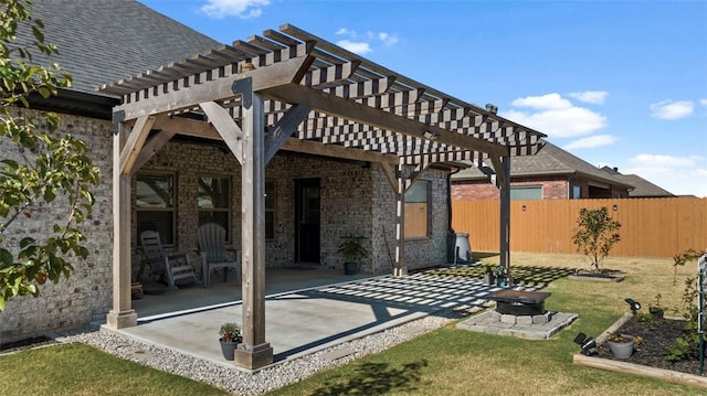 view of patio with a pergola and an outdoor fire pit