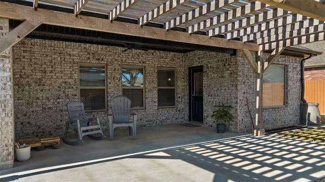 view of patio featuring a pergola