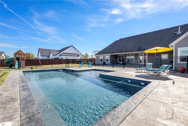 view of pool featuring a patio