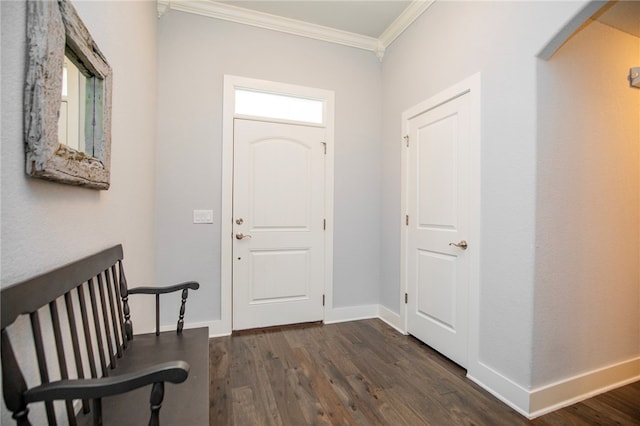 entrance foyer featuring dark hardwood / wood-style floors and ornamental molding