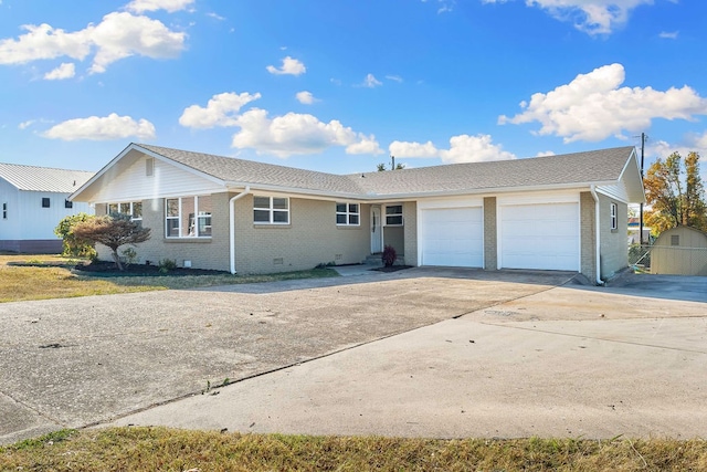 ranch-style home with a garage