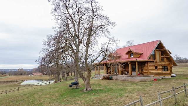 exterior space featuring a water view and covered porch