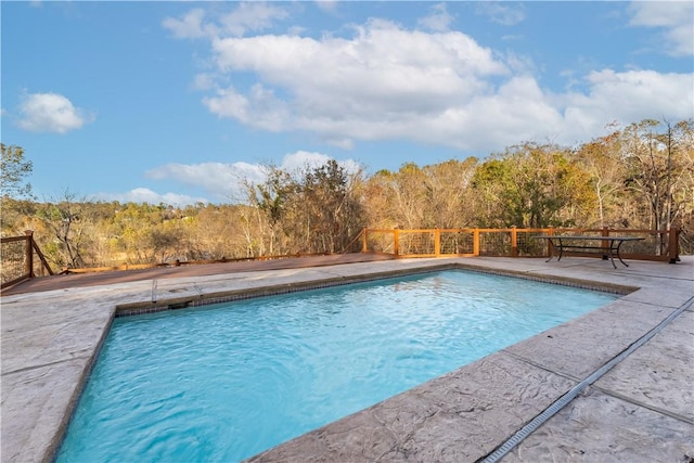 10729 Anzac Dr, Lowell, AR 72745 - view of pool featuring a forest view and a patio