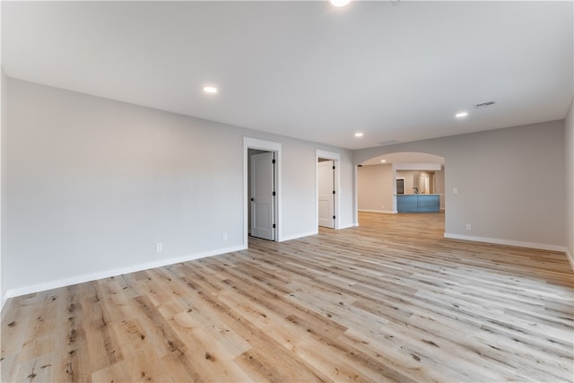 unfurnished living room featuring light hardwood / wood-style flooring