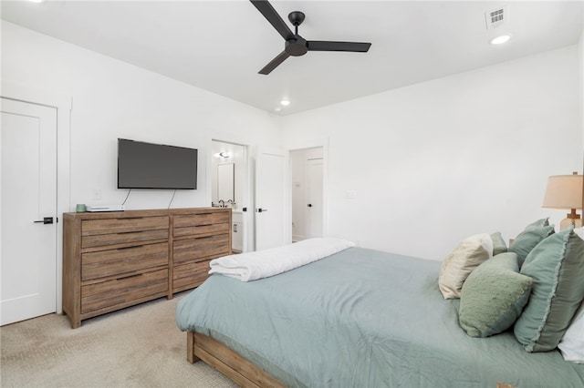 110 NE Briartown, Bentonville, AR 72712 - carpeted bedroom featuring ceiling fan and ensuite bath