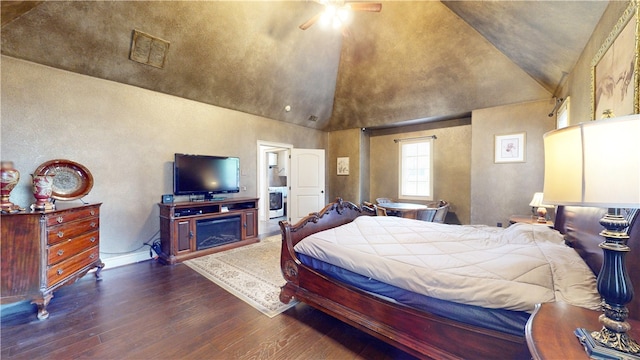 bedroom featuring washer / clothes dryer, ceiling fan, high vaulted ceiling, and dark hardwood / wood-style flooring