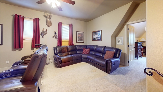 living room with ceiling fan, plenty of natural light, and carpet flooring