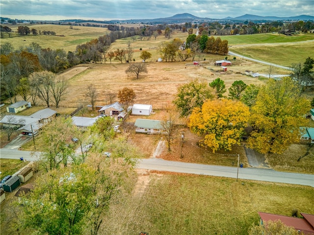 aerial view with a mountain view and a rural view