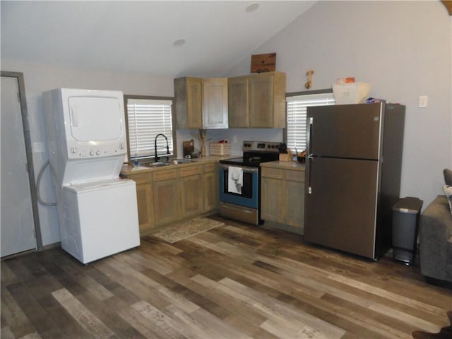305 Deer Run Rd, Leslie, AR 72645 - kitchen with stainless steel appliances, a sink, stacked washer / drying machine, dark wood-type flooring, and lofted ceiling