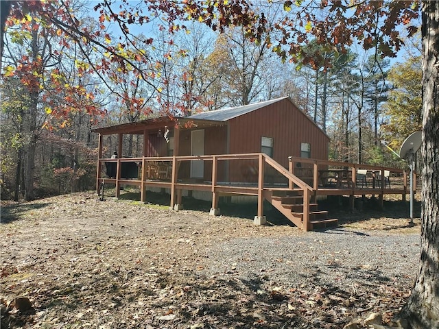 305 Deer Run Rd, Leslie, AR 72645 - view of side of home featuring a wooden deck