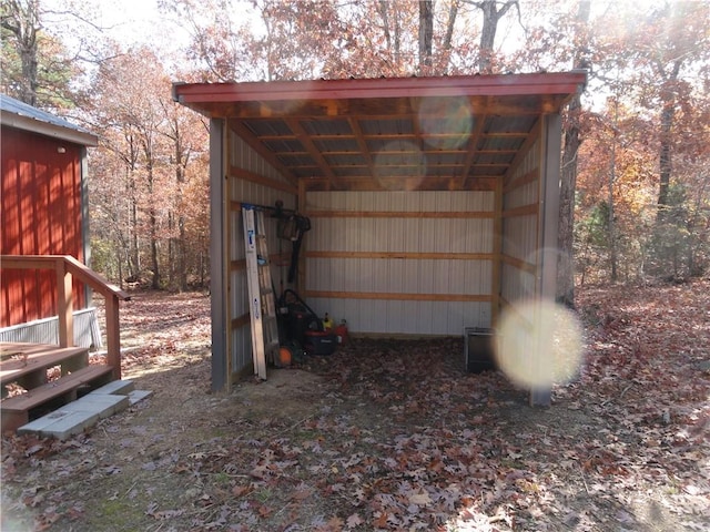 305 Deer Run Rd, Leslie, AR 72645 - view of outbuilding featuring a wooded view