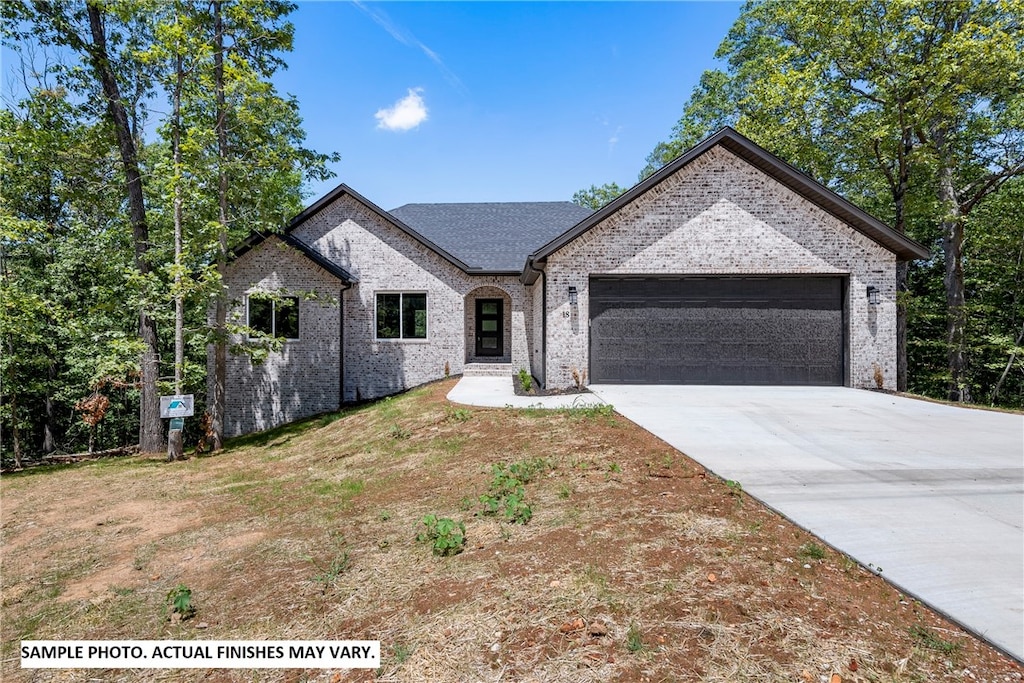 french country inspired facade with a garage