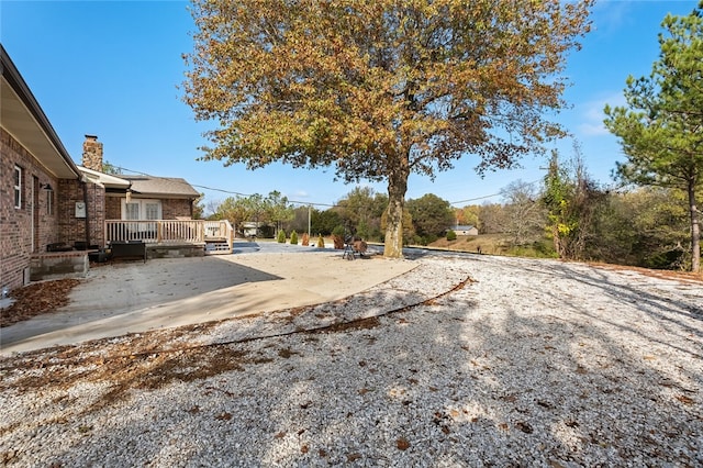 view of yard featuring a deck