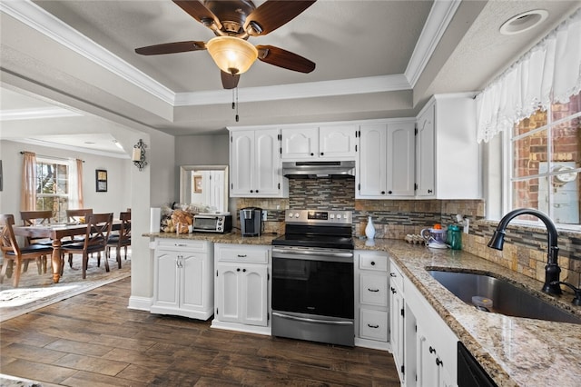 kitchen featuring dark wood-type flooring, stainless steel electric range, sink, and white cabinets