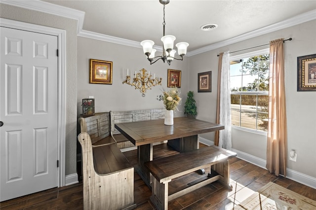 dining area featuring a chandelier, dark hardwood / wood-style floors, and crown molding