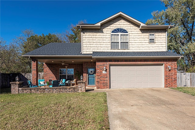 front facade featuring a garage and a front yard