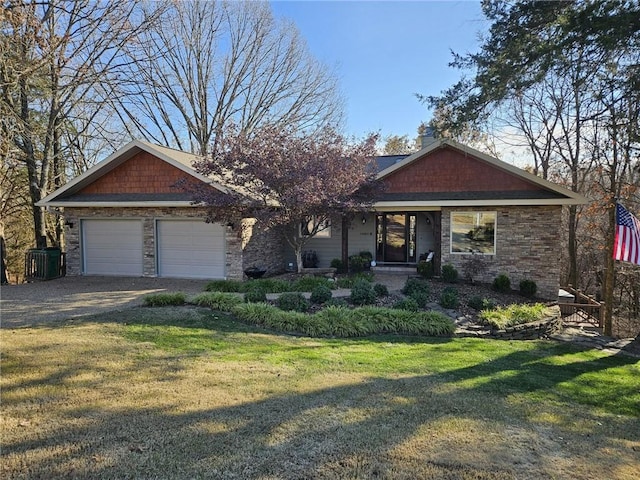 view of front of property featuring a front yard, central AC, and a garage