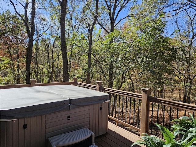 deck with a hot tub