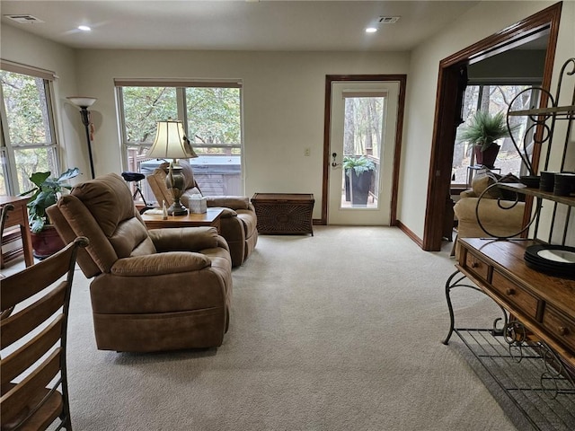 living room with light colored carpet