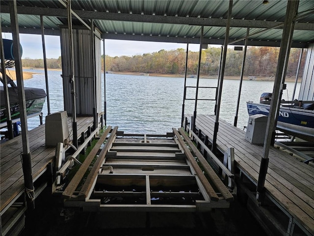 view of dock with a water view