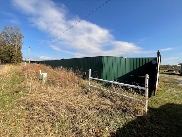 view of outbuilding with a rural view