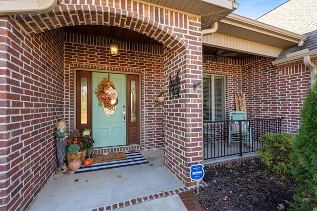 1303 NW Hermanus St, Bentonville, AR 72712 - doorway to property featuring brick siding