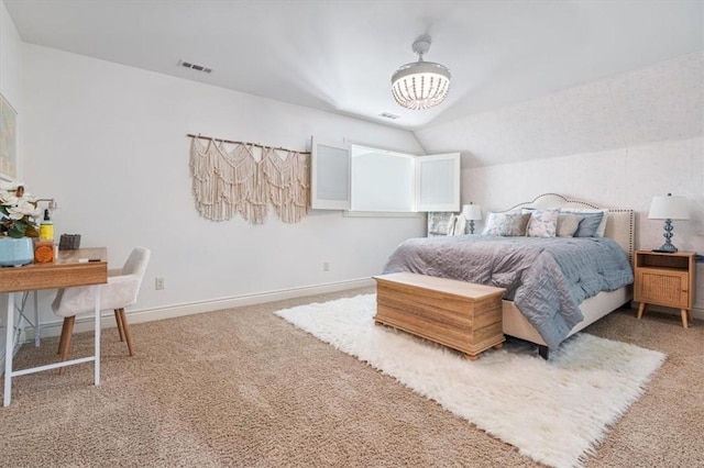 1303 NW Hermanus St, Bentonville, AR 72712 - bedroom featuring carpet floors, a chandelier, baseboards, lofted ceiling, and visible vents