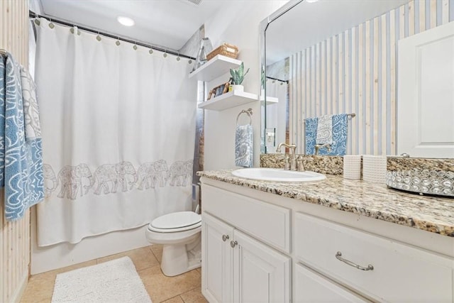 1303 NW Hermanus St, Bentonville, AR 72712 - full bathroom with vanity, shower / tub combo with curtain, tile patterned floors, and toilet