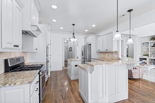 1303 NW Hermanus St, Bentonville, AR 72712 - kitchen featuring crown molding, decorative backsplash, white cabinets, and stainless steel appliances