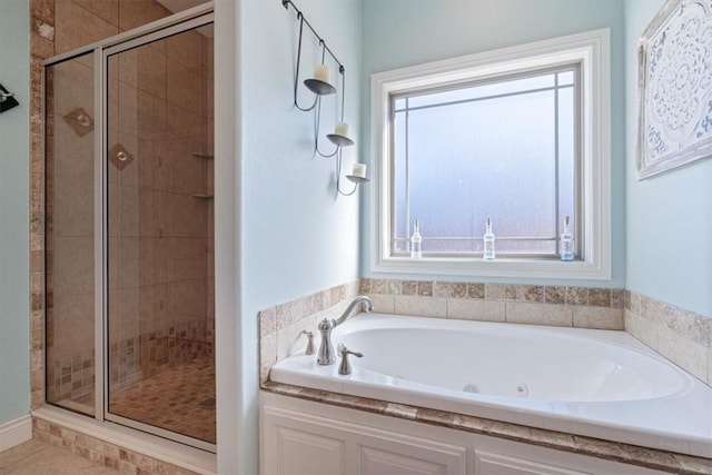 1303 NW Hermanus St, Bentonville, AR 72712 - bathroom featuring a tub with jets and a stall shower