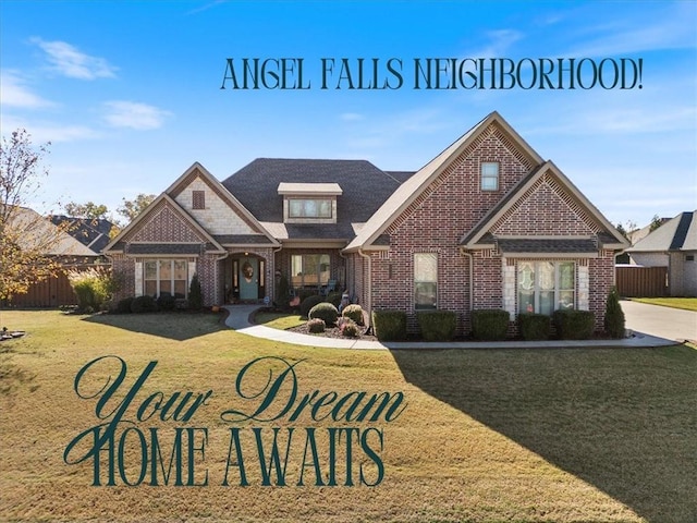 1303 NW Hermanus St, Bentonville, AR 72712 - view of front of house featuring brick siding, fence, and a front yard