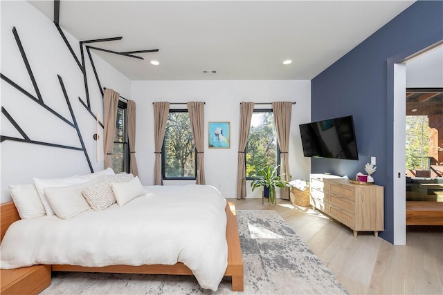 514 N Vinson Ave, Fayetteville, AR 72701 - bedroom featuring multiple windows, light wood-type flooring, and recessed lighting