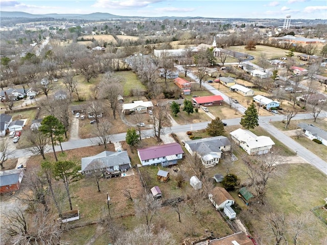 aerial view featuring a mountain view and a residential view