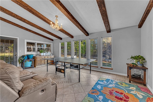 game room featuring light tile patterned floors, vaulted ceiling with beams, a textured ceiling, and a notable chandelier