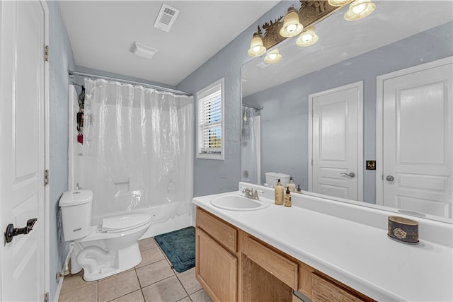 full bathroom with tile patterned flooring, shower / tub combo, vanity, and toilet