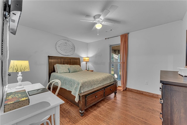 bedroom featuring ceiling fan and light hardwood / wood-style floors