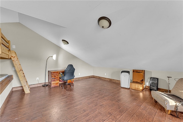 office area with dark wood-type flooring and vaulted ceiling