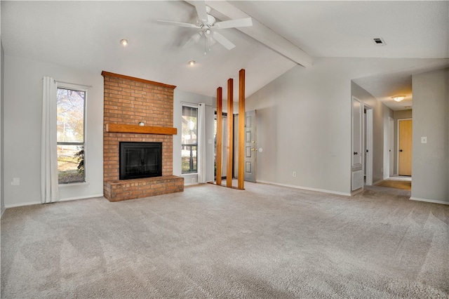 unfurnished living room with lofted ceiling with beams, light colored carpet, and ceiling fan