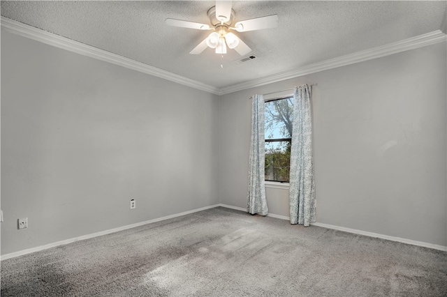 carpeted spare room with a textured ceiling, ceiling fan, and crown molding