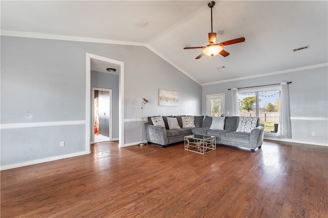 living room with crown molding, dark wood-type flooring, ceiling fan, and lofted ceiling