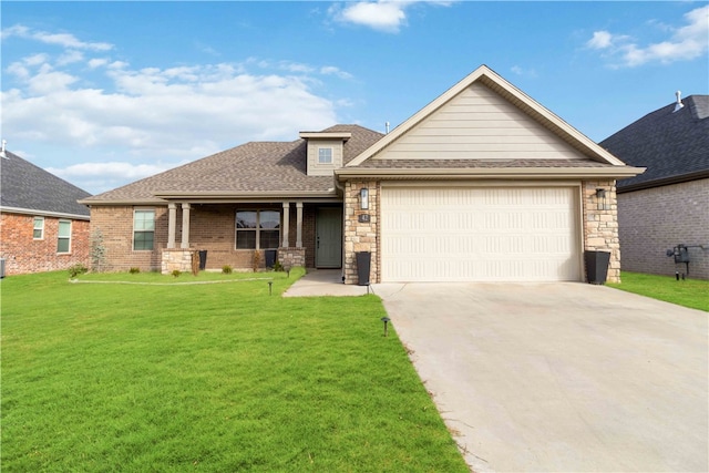 view of front facade featuring a garage and a front lawn