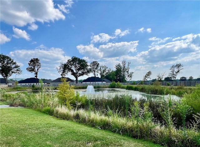 view of yard with a water view