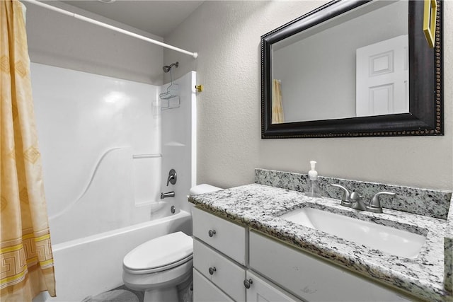 full bathroom with shower / bath combo with shower curtain, vanity, and toilet