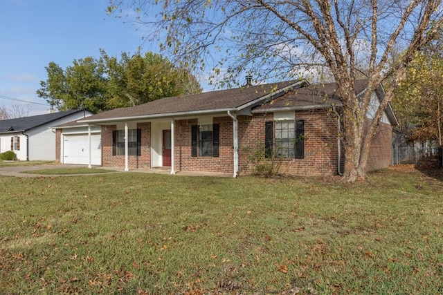 ranch-style home with a garage and a front yard