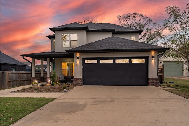 prairie-style house featuring a garage