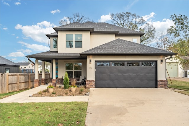 view of front of house with a garage and covered porch