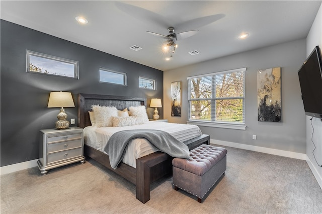 carpeted bedroom with ceiling fan