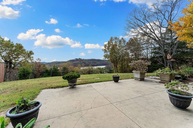 view of patio / terrace featuring a water view