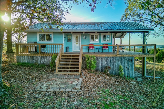 view of front of house featuring a deck