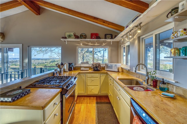 kitchen with stainless steel appliances, light hardwood / wood-style floors, sink, high vaulted ceiling, and beamed ceiling